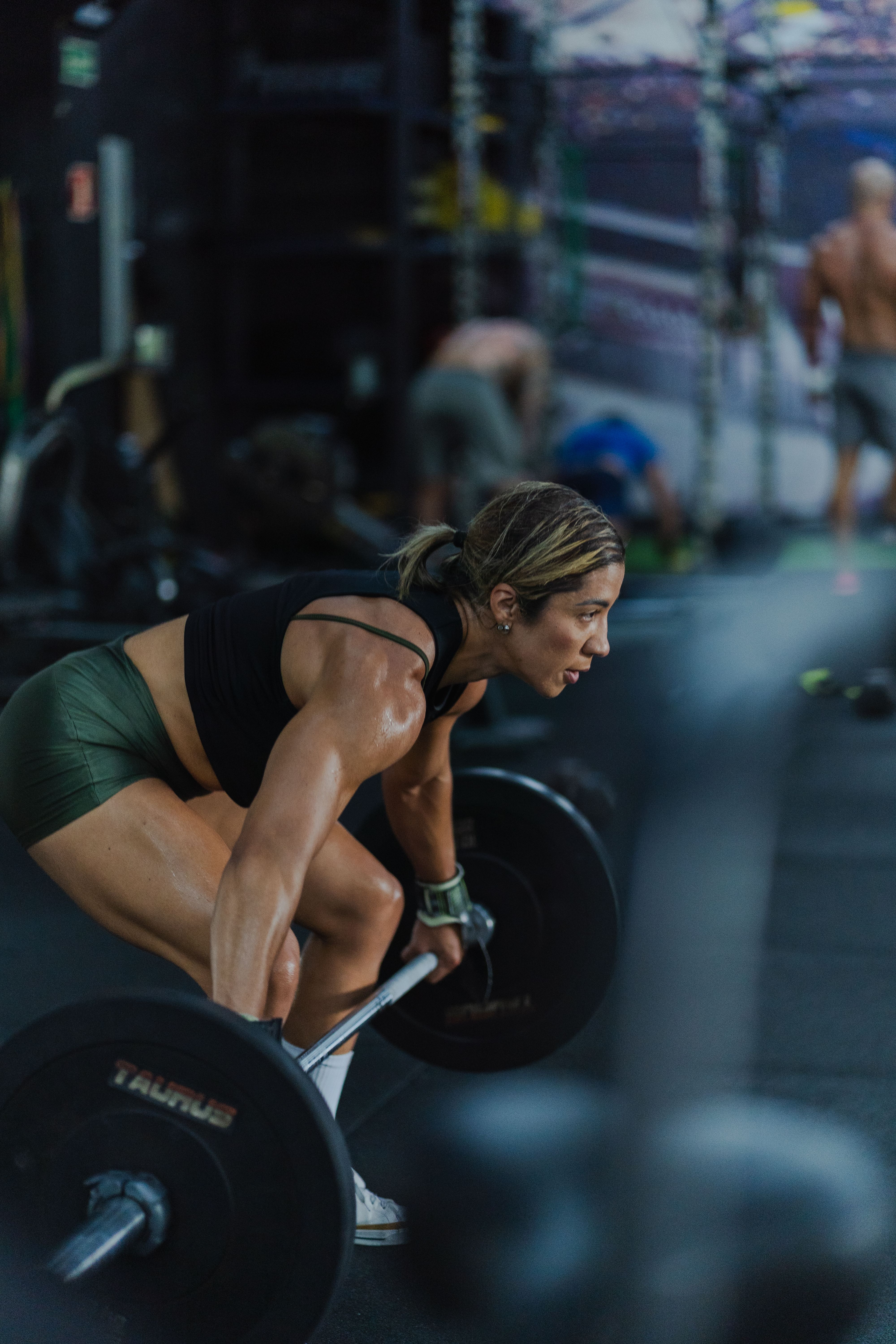  Athlete lifting a barbell in the gym — 4Balance Forge WOD functional strength and conditioning