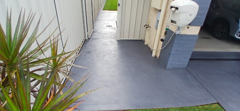 painted pathway beside a house