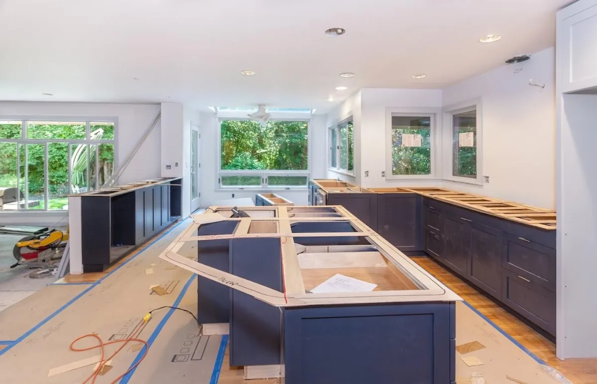 Kitchen in the process of repairs and refinishing after fire damage and fire extinguisher residue cleanup, showcasing VHrestoration's expert fire damage restoration services.