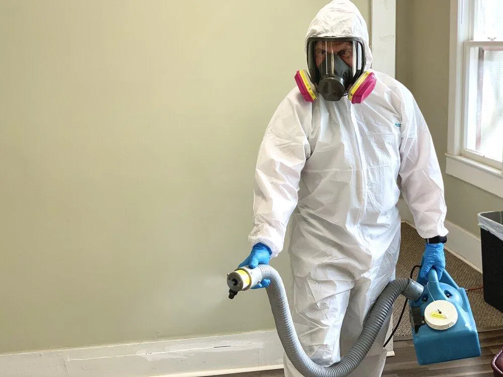 Technician performing odor removal with fogging equipment in Blaine, Lino Lakes, Andover & surrounding areas, demonstrating VHrestoration's odor control services for thorough odor elimination.