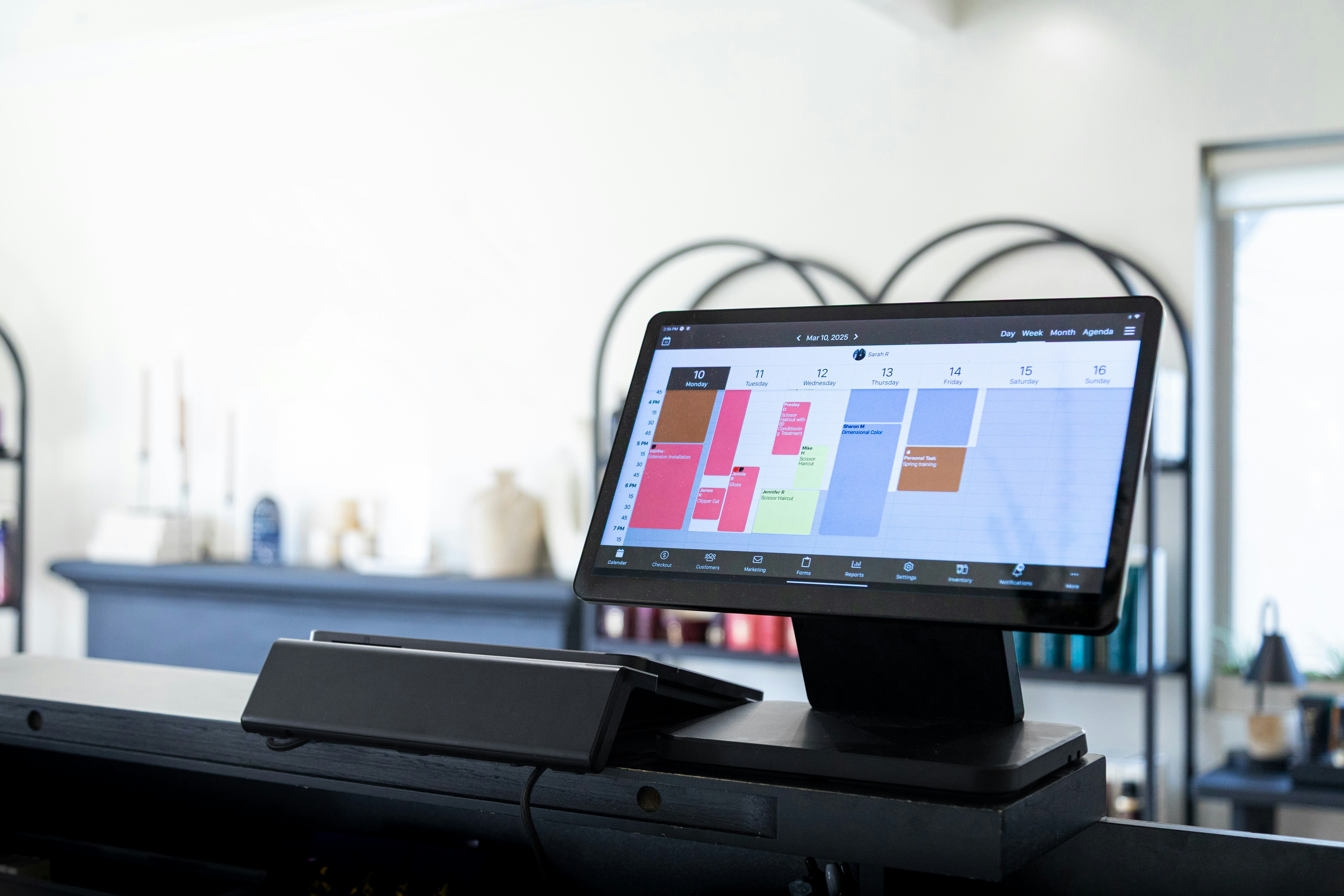 black laptop computer on table