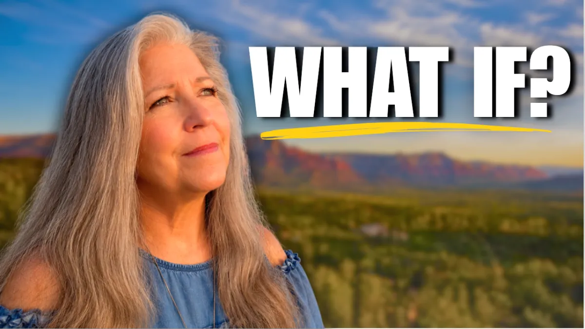 Woman with long gray hair gazes thoughtfully toward a scenic desert mountain landscape at sunset beside large white text reading "WHAT IF?" with a yellow underline.
