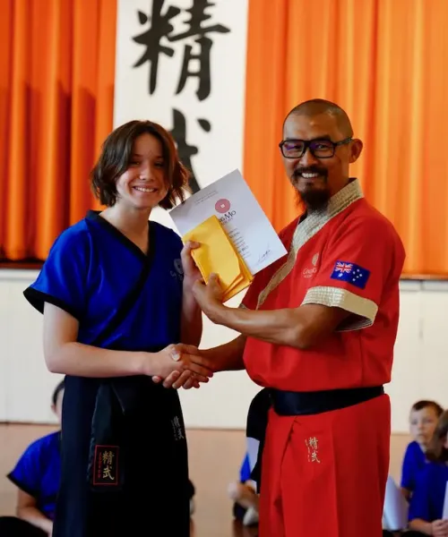 Ging Mo Academy Child graduates from martial arts Play Fu class