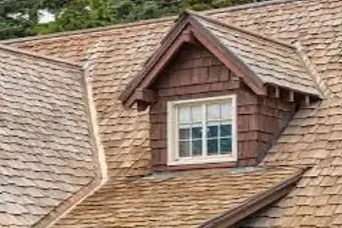 Natural cedar shake wood roof with dormer window on residential home in Eden Prairie