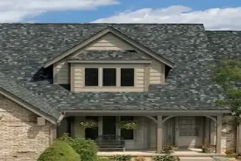 Finished residential roof with architectural shingles on craftsman home in Eden Prairie by Eden Prairie Roofing