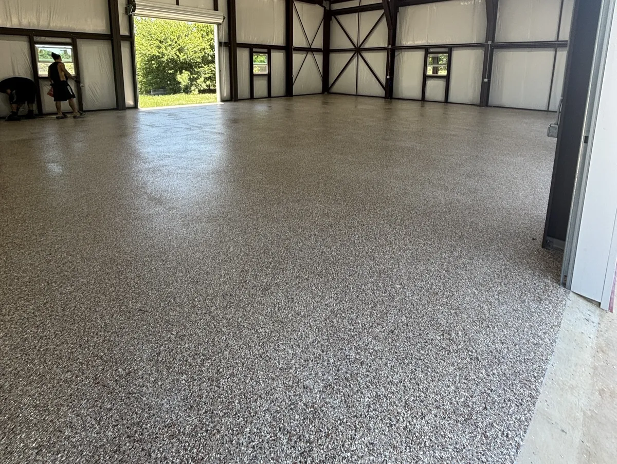 Flake epoxy floor in a metal shop building