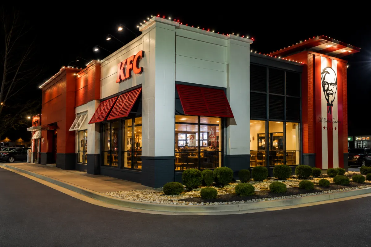 Christmas light installation on office buildings with elegant white lights and festive holiday decorations.