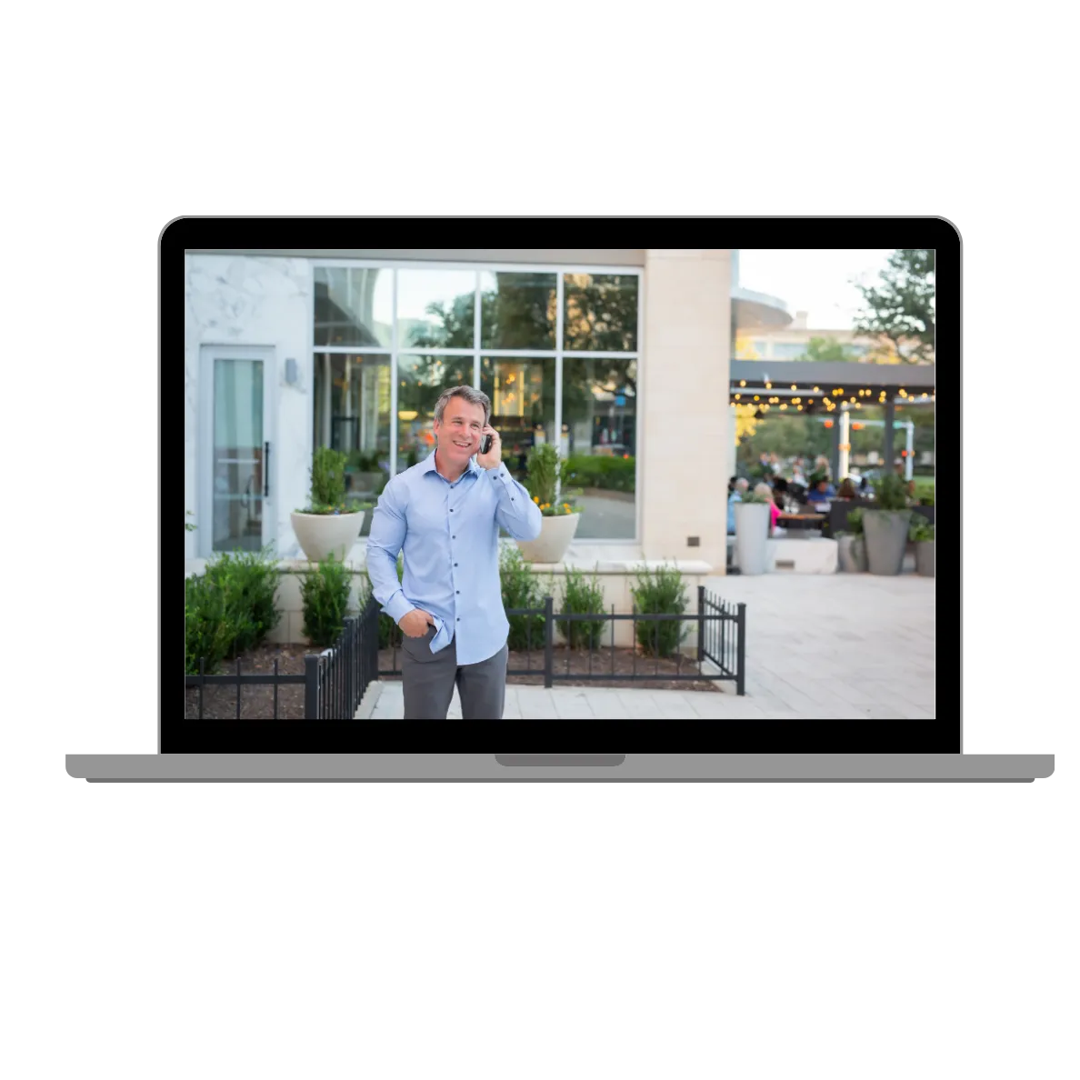 Mark Kenney of Think Multifamily on a phone call coaching a client, providing expert advice on multifamily real estate investing and syndication.