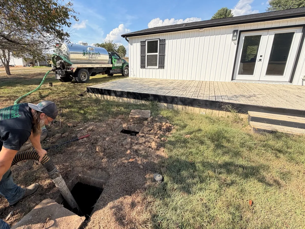 Shamrock Septic crew pumping a septic tank near Auburntown, Tennessee
