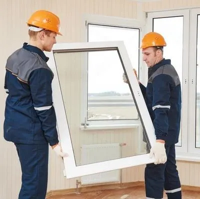 Pure Windows’ licensed Cincinnati contractors installing durable American-made window, demonstrating expert craftsmanship and local service commitment