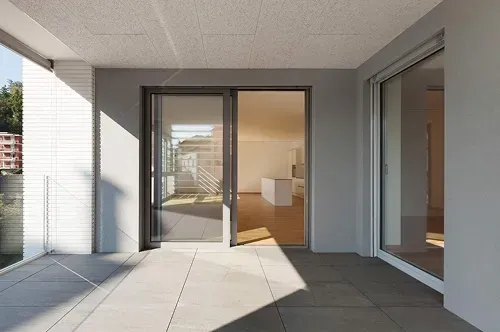 Sleek sliding glass door installation by Pure Windows in a Cincinnati home, allowing abundant natural light and seamless access to the outdoor living space
