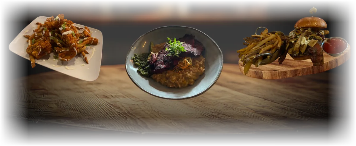 Three restaurant dishes made with mushrooms on a wooden table