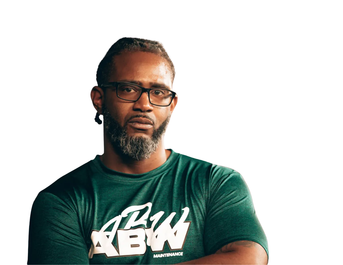 USMC Veteran Lead Engineer Maurice performing technical diagnostics and precision maintenance on facility infrastructure for ABW Maintenance.