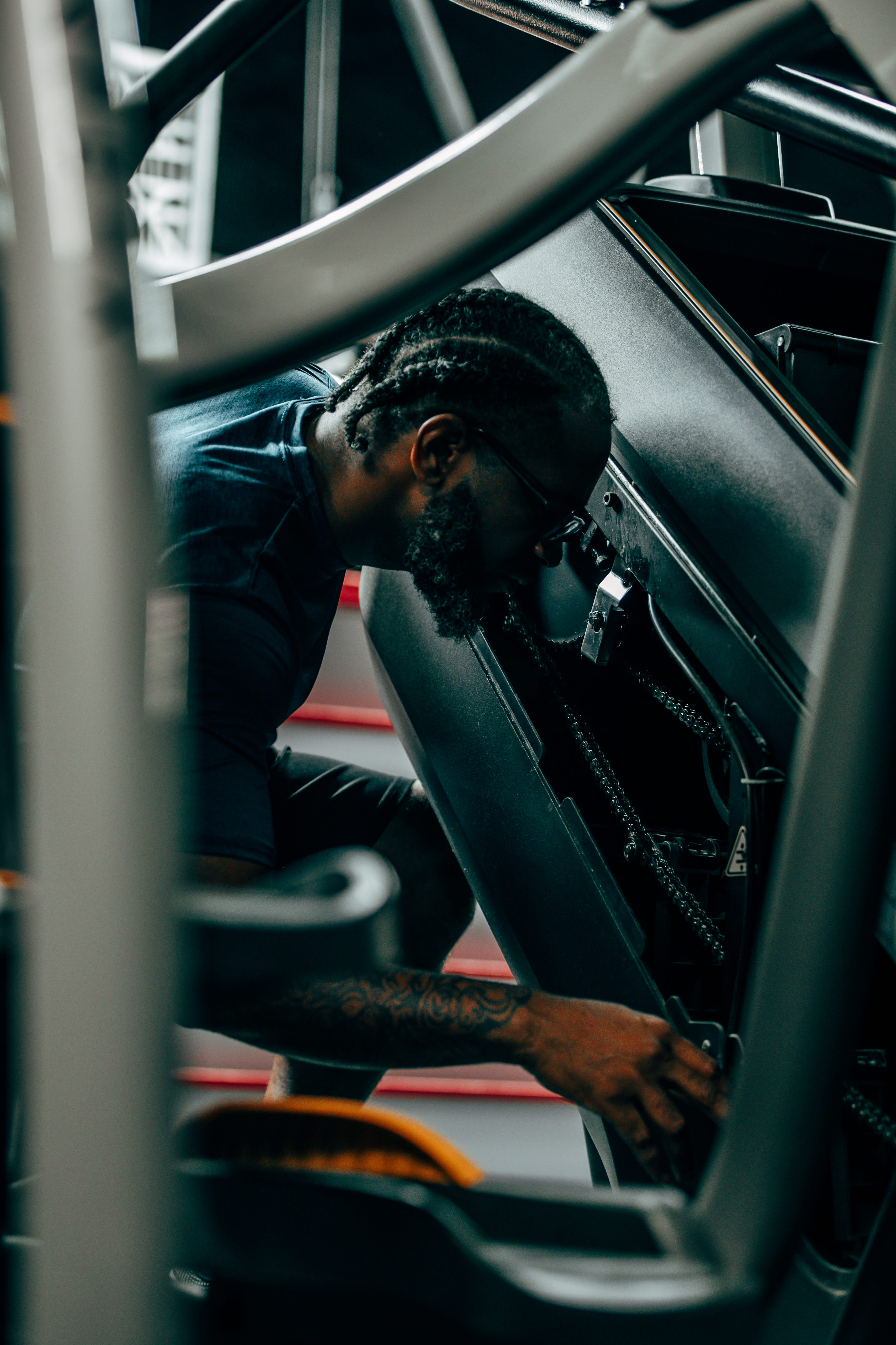 USMC Veteran Lead Engineer Maurice performing technical diagnostics and precision maintenance on facility infrastructure for ABW Maintenance.