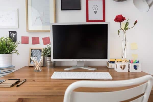 Desk with computer and chair