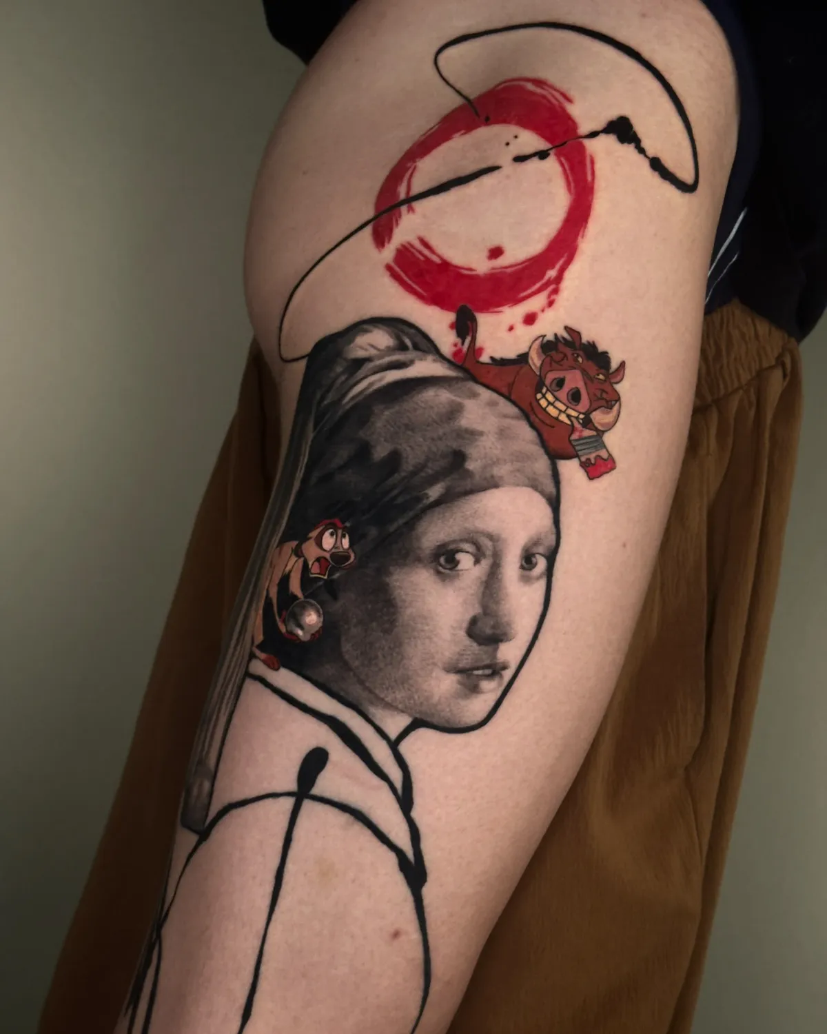 person with tattoo on right arm