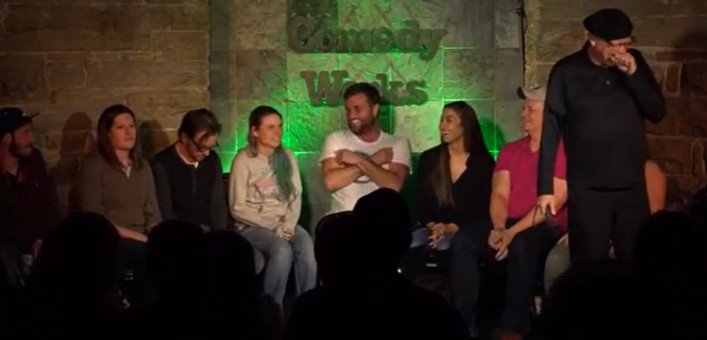 Audience laughing at a clean comedy hypnosis show