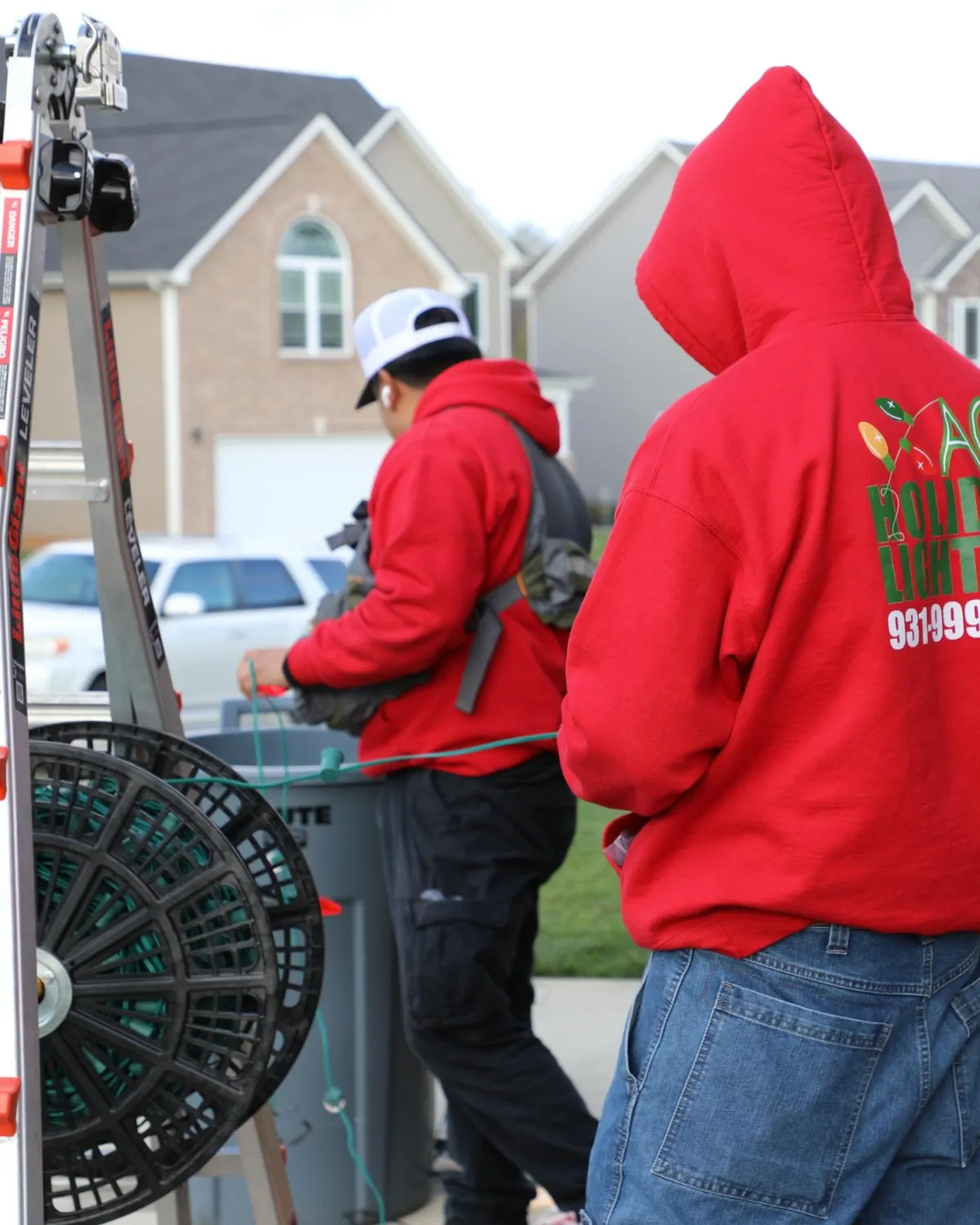 The experienced crew at AG Holiday Lighting installing Christmas lights