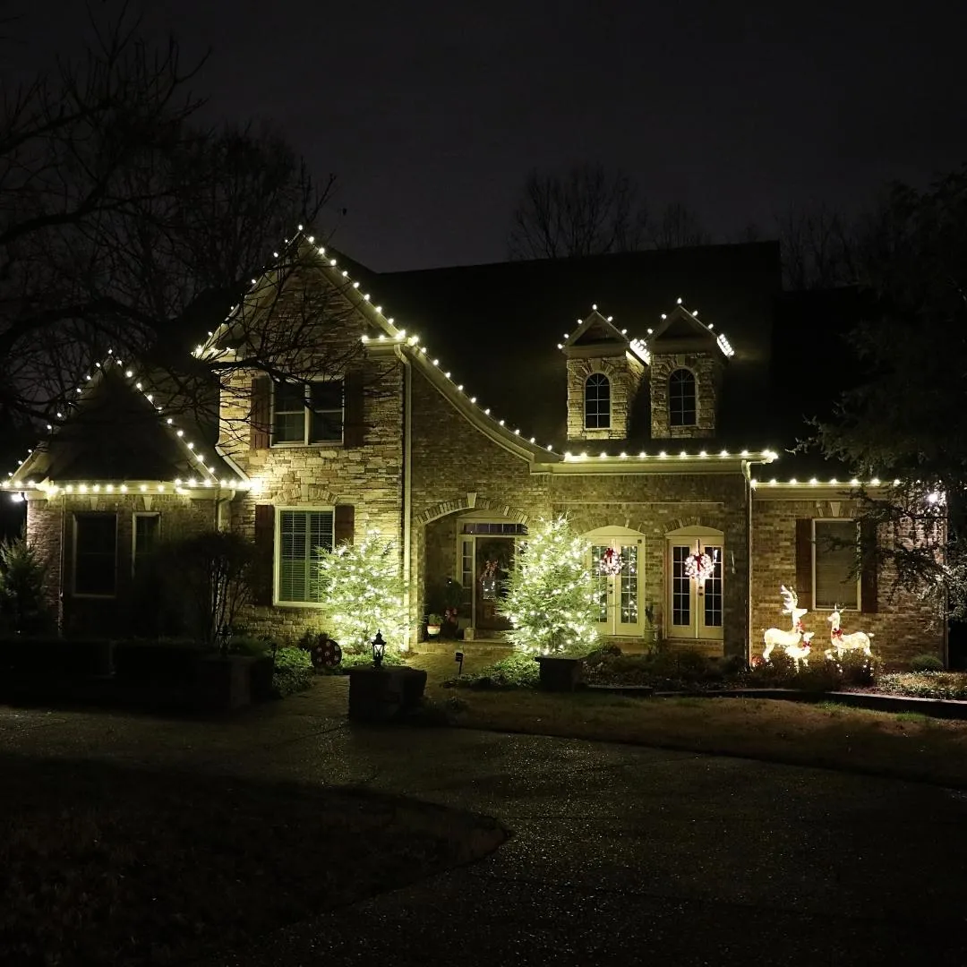A set of finishing Christmas lights on a home in Tennessee