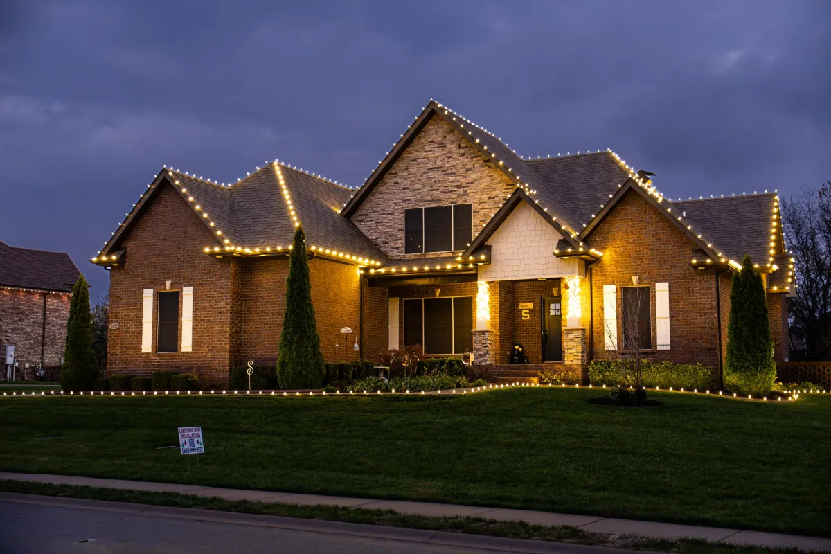 A set of finishing Christmas lights on a home in Tennessee