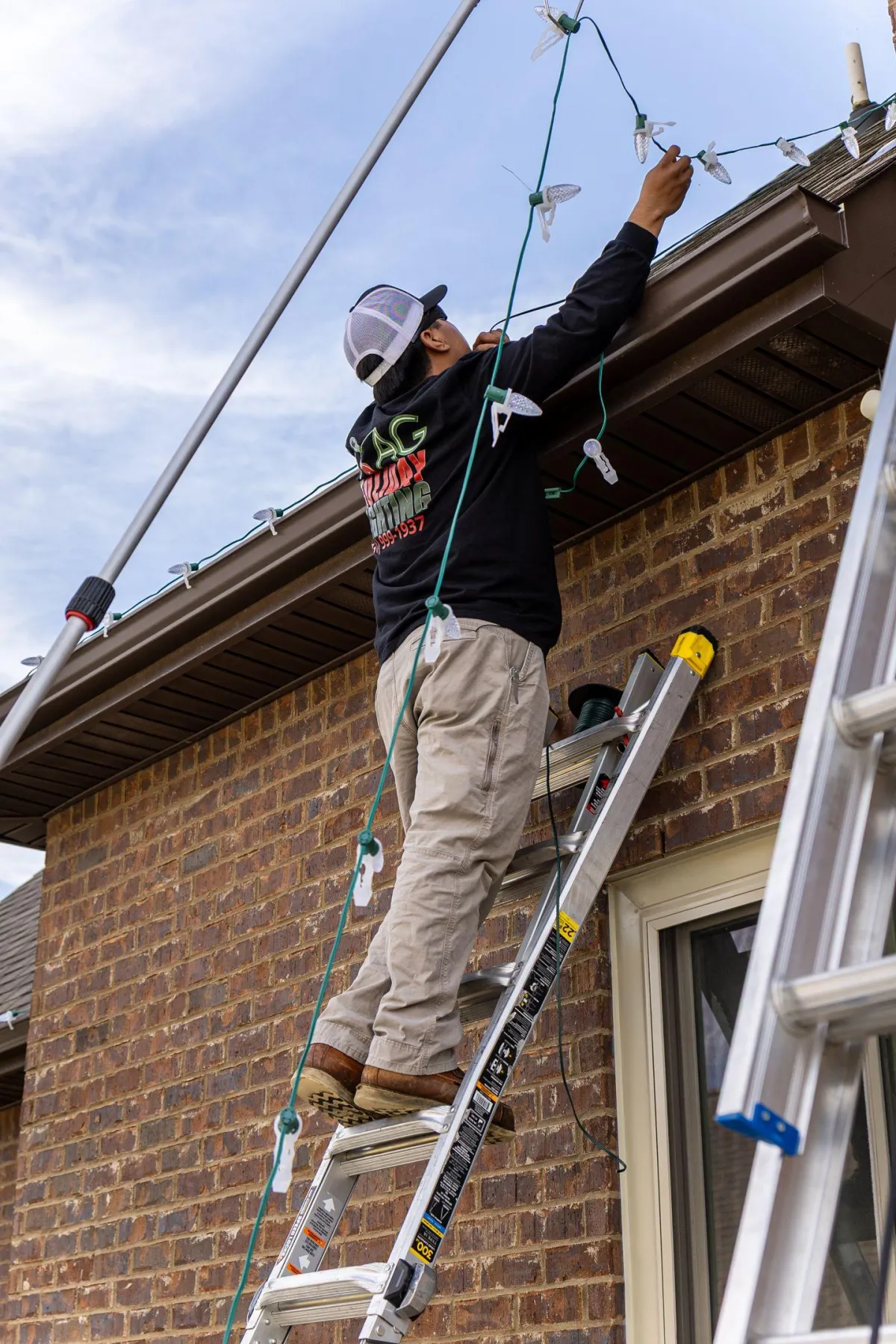 One of the quality technicians preparing ights at AG Holiday Lighting