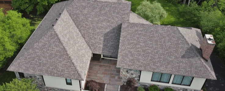 Aerial view of a residential roof replacement in Vestavia Hills Alabama with architectural asphalt shingles installed by Blackline Roofing