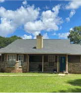 Full home view of roof replacement in Pelham Alabama with asphalt shingles due to aging roof by Blackline Roofing