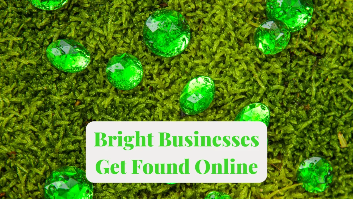Bright emeralds spread across a green moss with text block Bright Businesses Get Found Online in bright green to match emeralds