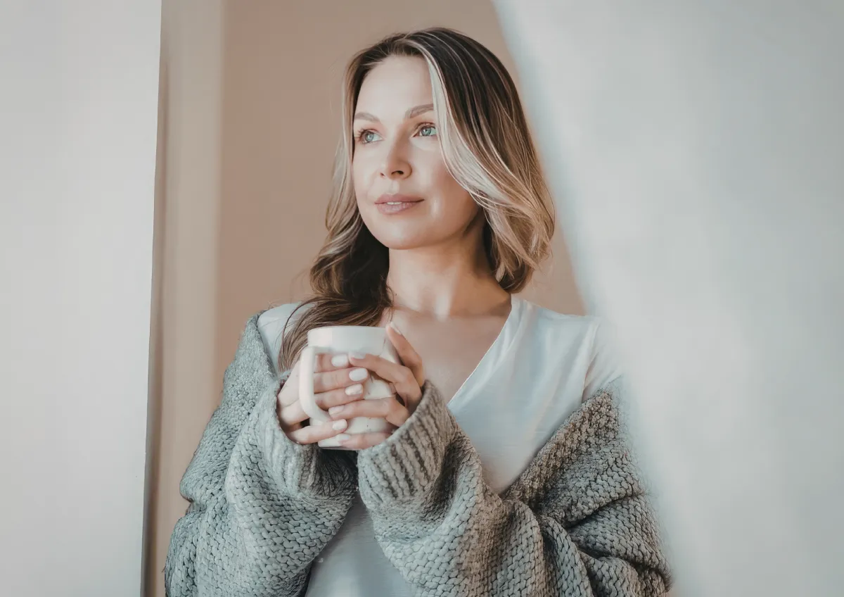 Woman taking a moment for herself with a cup of herbal tea