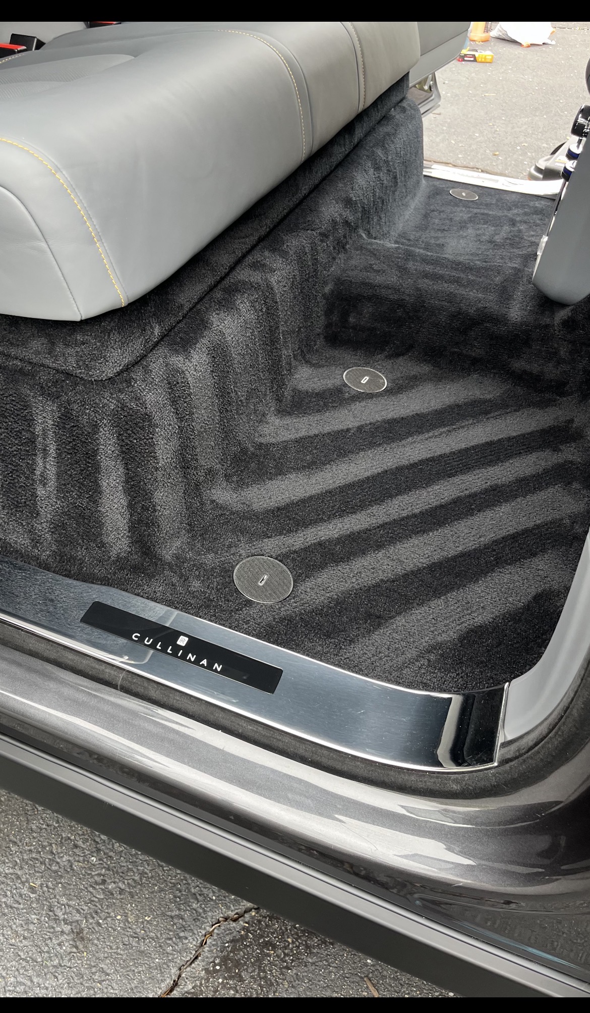 Close-up of metal gears and a handle.