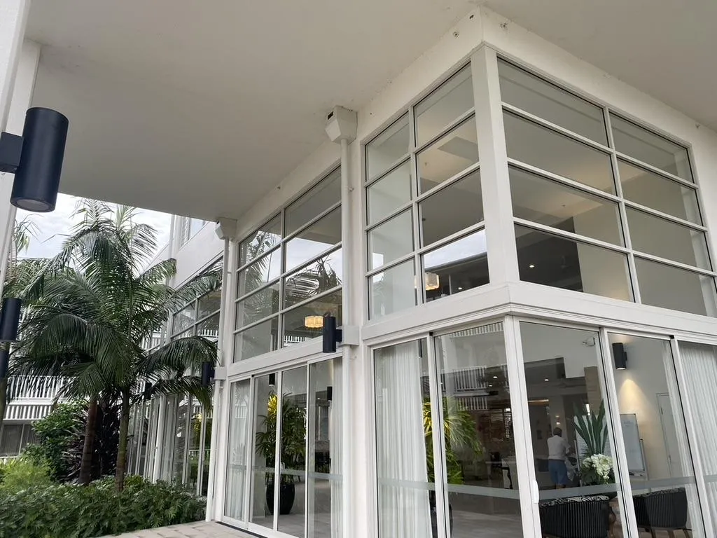 Commercial window cleaning on Gold Coast office building with streak-free glass
