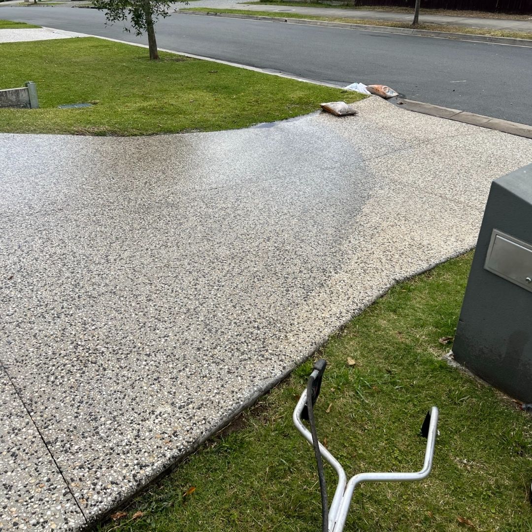Flat surface cleaning Gold Coast using rotary surface cleaner on concrete