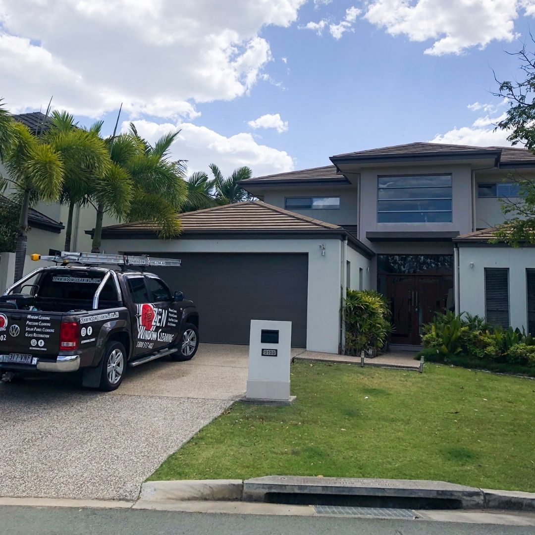 Sparkling clean windows on a Gold Coast home with sunlight streaming through