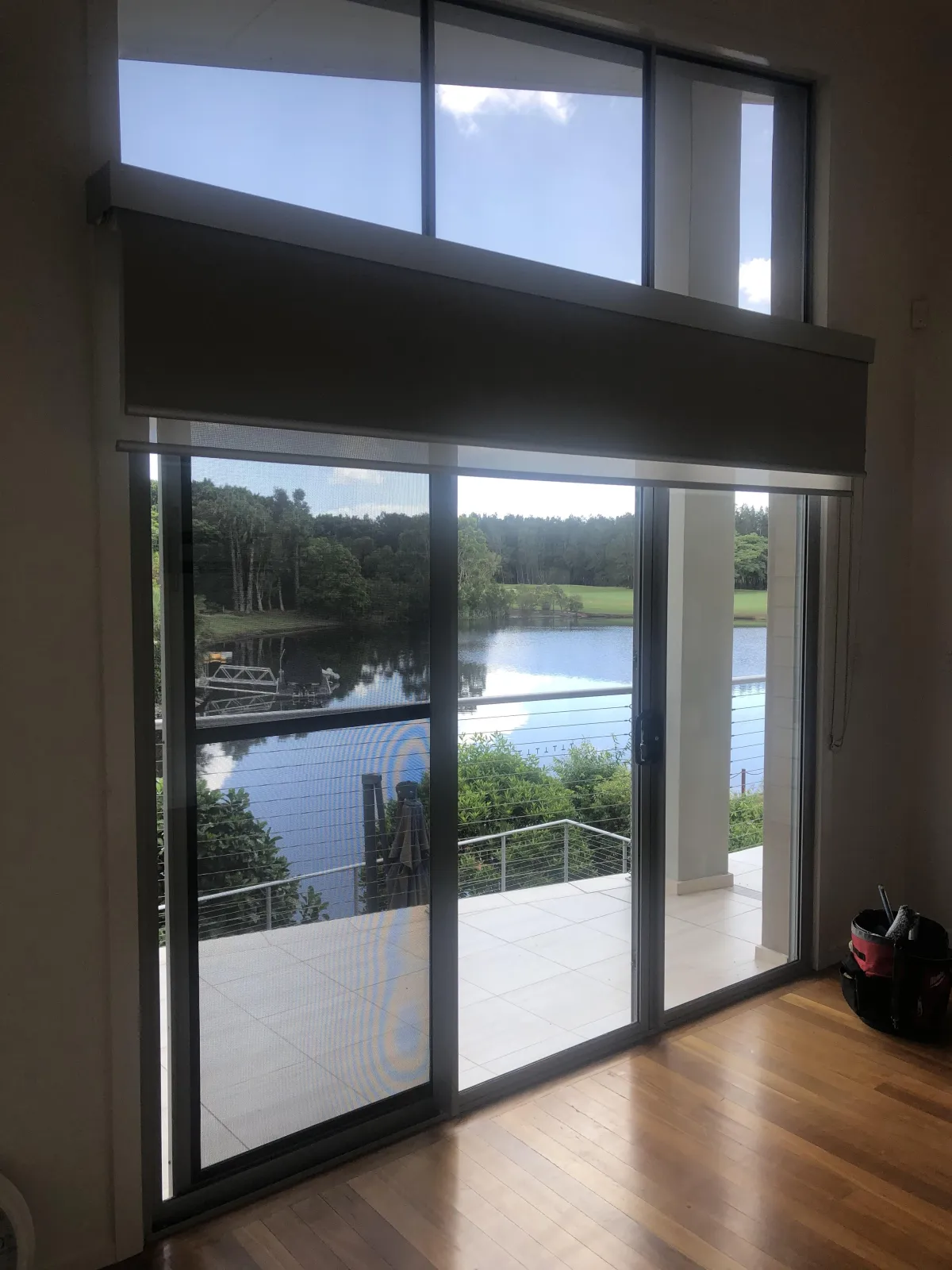 Residential window cleaning on a Carrara home with sparkling clean glass and streak-free finish