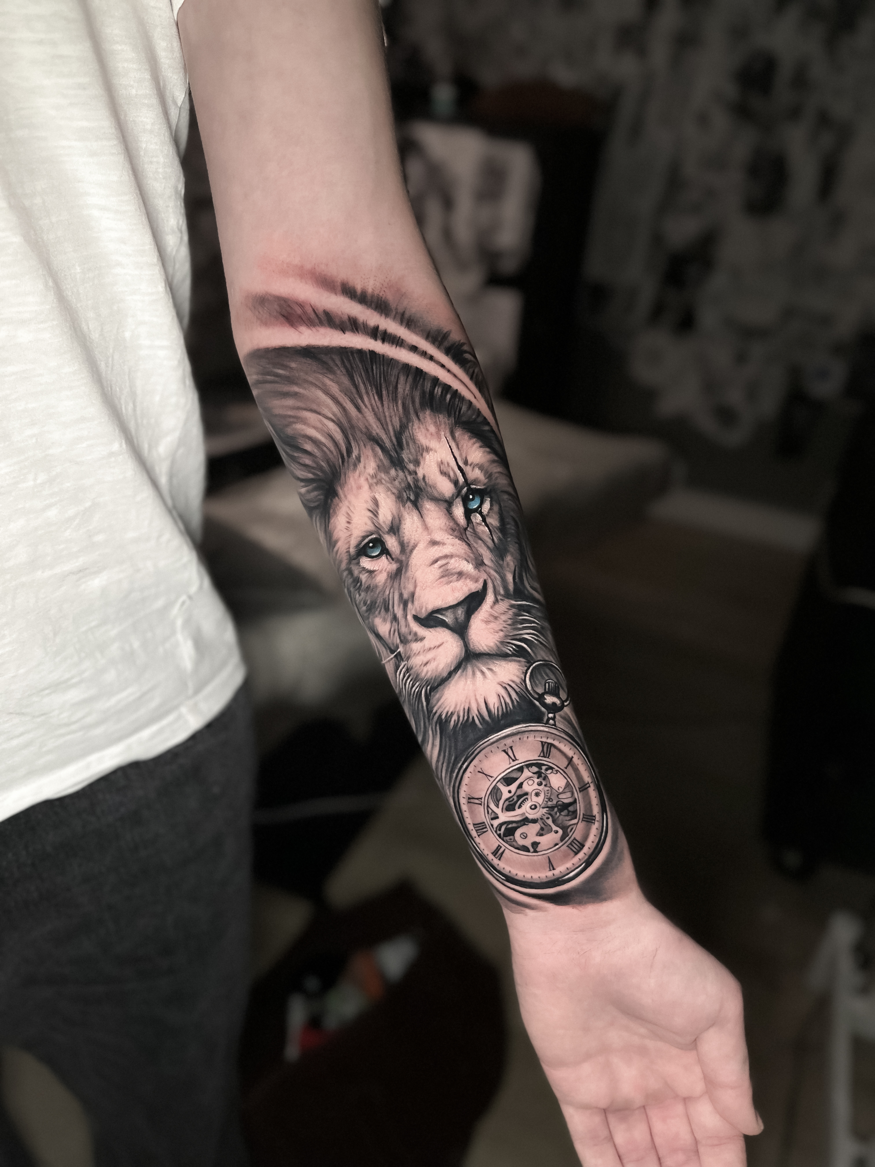 person with tattoo on right arm