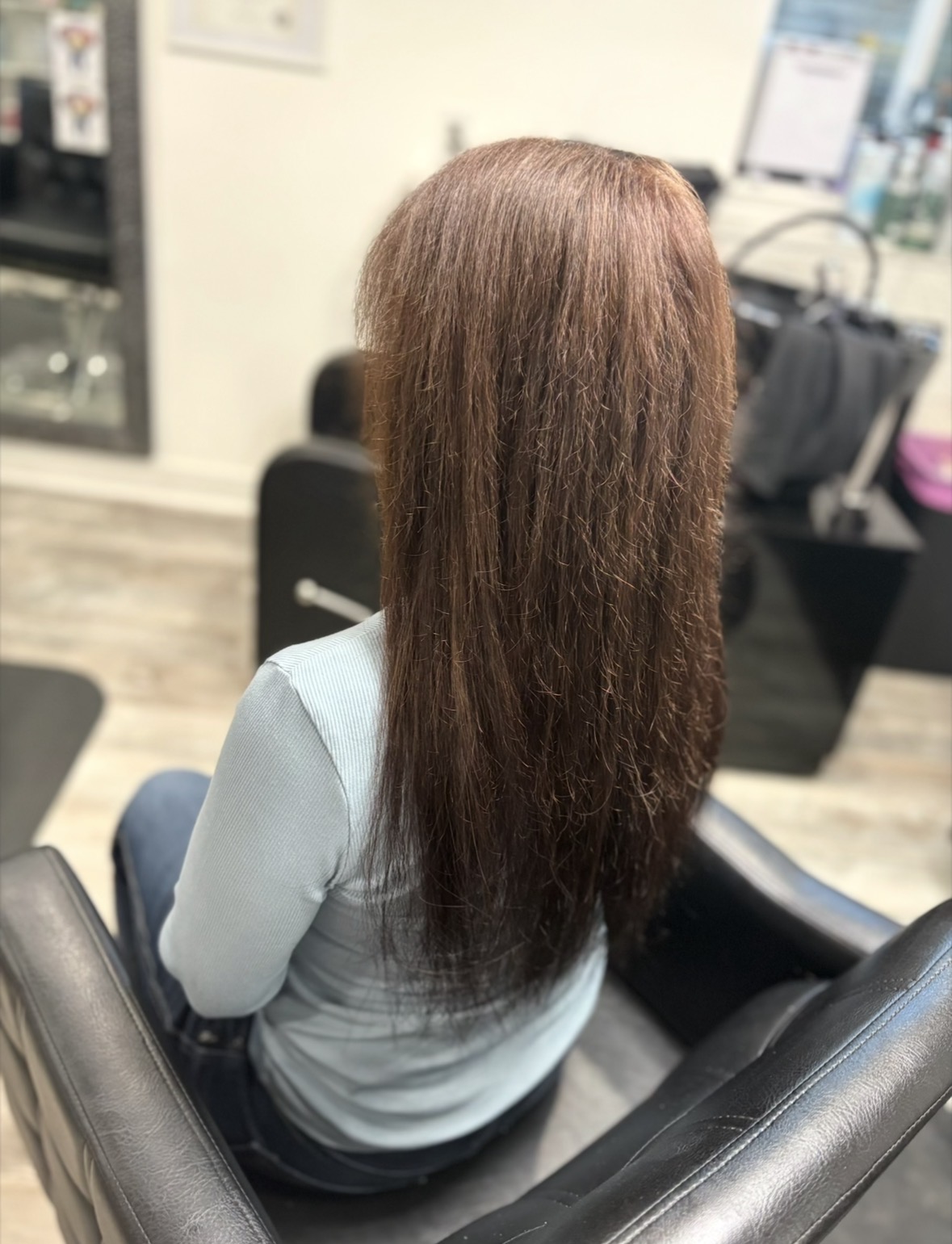 Long brunette hair extension transformation by Beauty Empowered