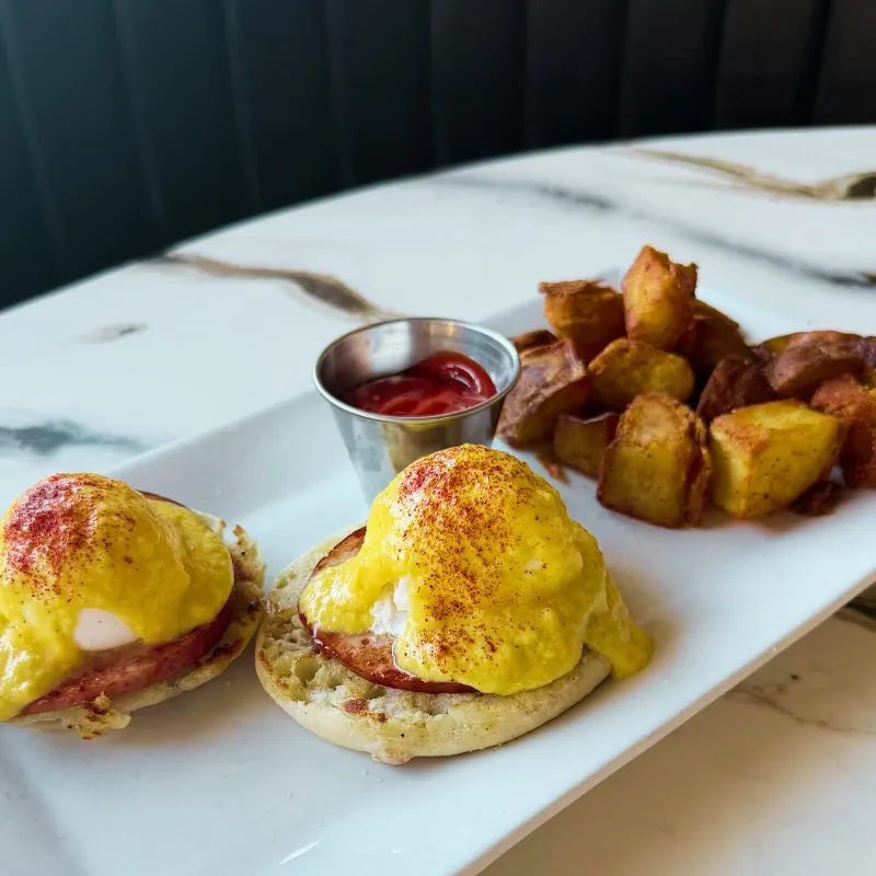 Classic eggs benedict brunch dish at Easy Like Sunday in Greensboro NC