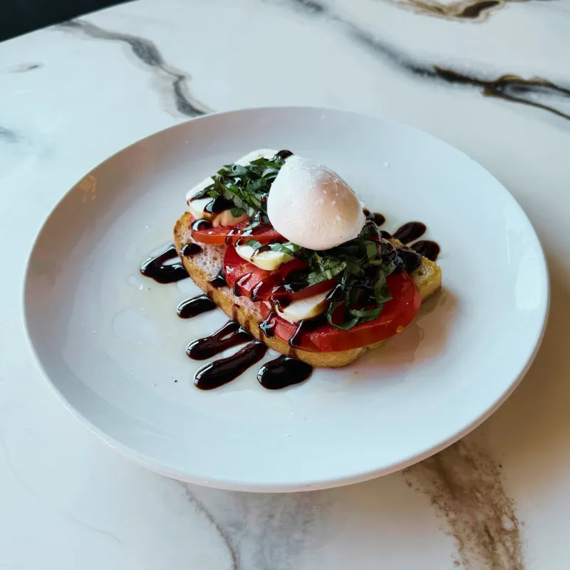 Caprese toast brunch dish at Easy Like Sunday in Greensboro NC