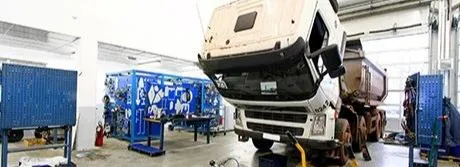 King pin service setup in a heavy-duty alignment bay