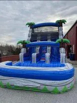 Blue and grey Bouncy House with integrated slide