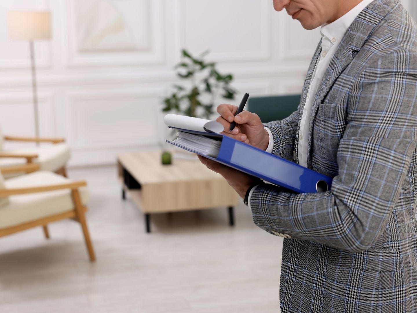 Professional property inventory clerk documenting rental property