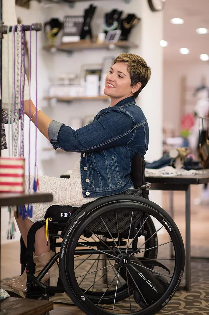 women sitting in custom wheelchair