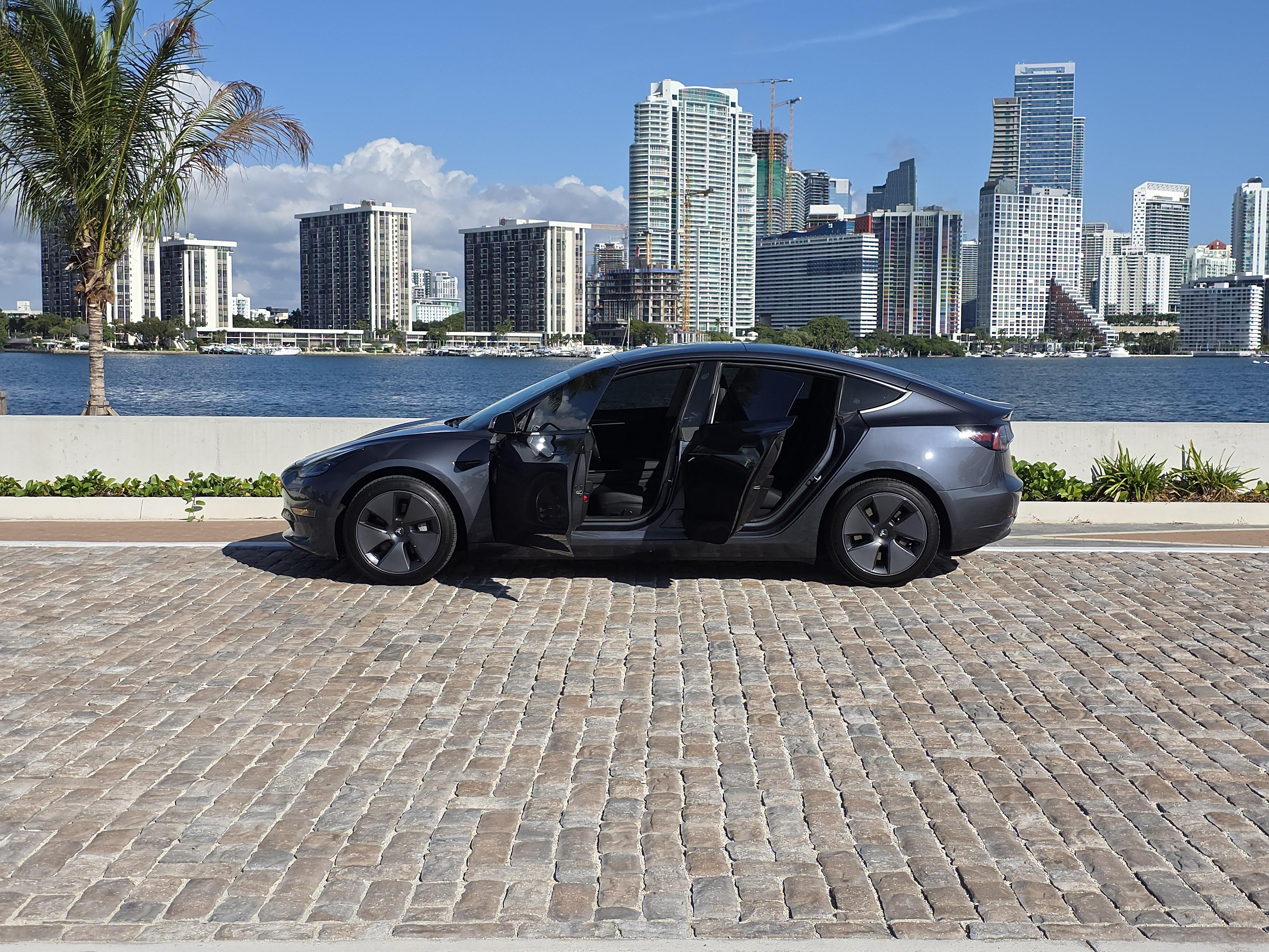 Tesla Model Y rental pricing in Miami — electric SUV available for $95/day from Amped Auto Rentals with free delivery