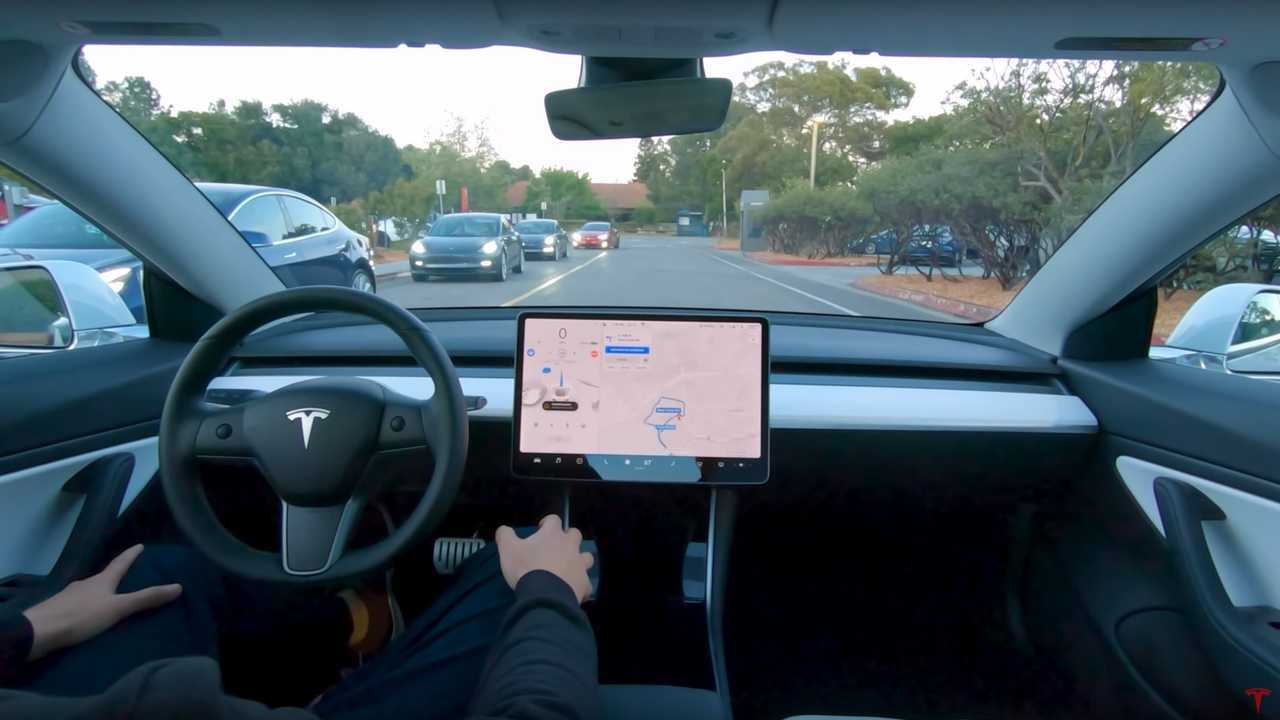 Tesla Full Self-Driving Supervised display on an Amped Auto Rentals Tesla in Miami, South Florida