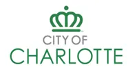 The logo for City of Charlotte. Features a green crown.