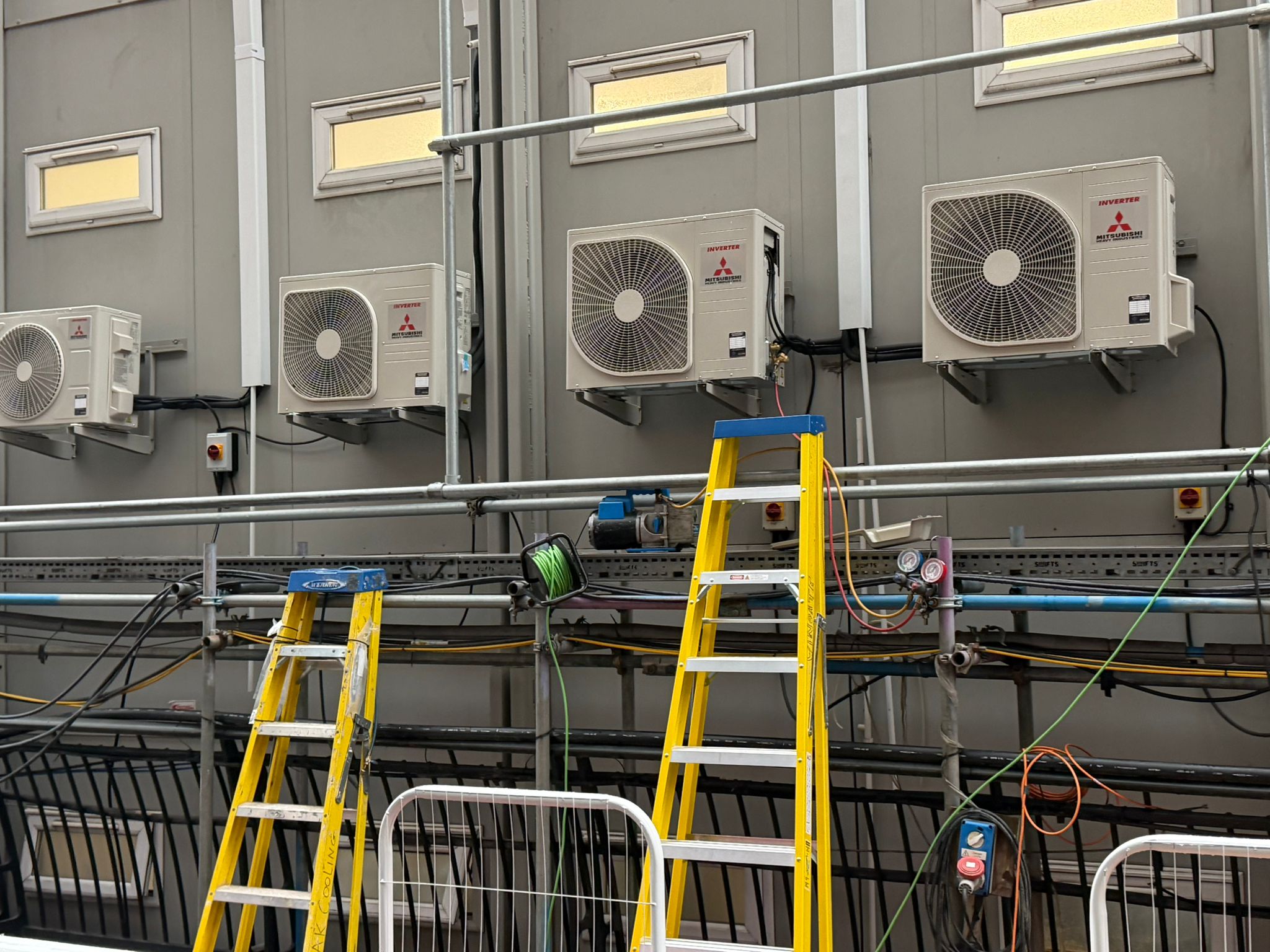 A K Cooling engineer installing a multi split air conditioning system in a Wickford property