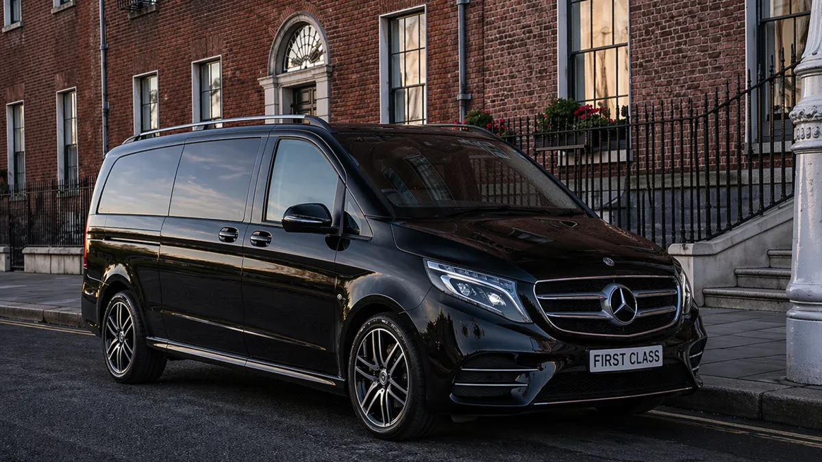 Black Mercedes V-Class arriving at a traditional Irish countryside manor