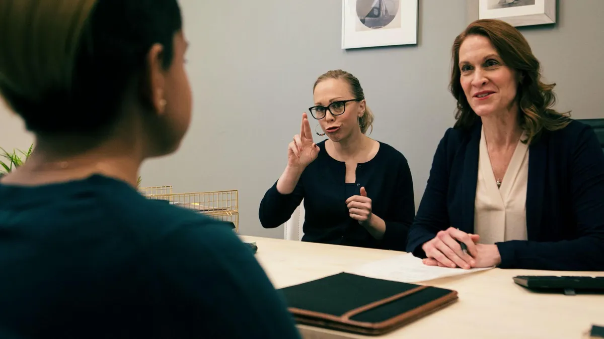 a group of people standing next to each other