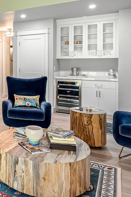 woman setting sheets on bed