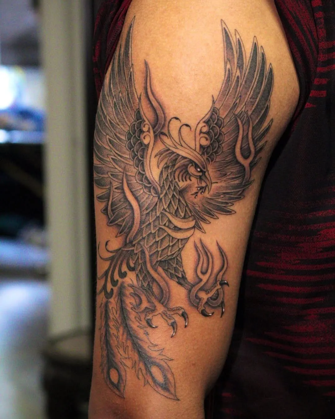 person in blue denim shorts and white nike sneakers standing on gray concrete floor